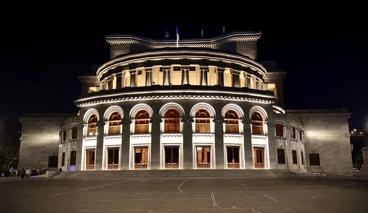 Building facade lit with warm light at night