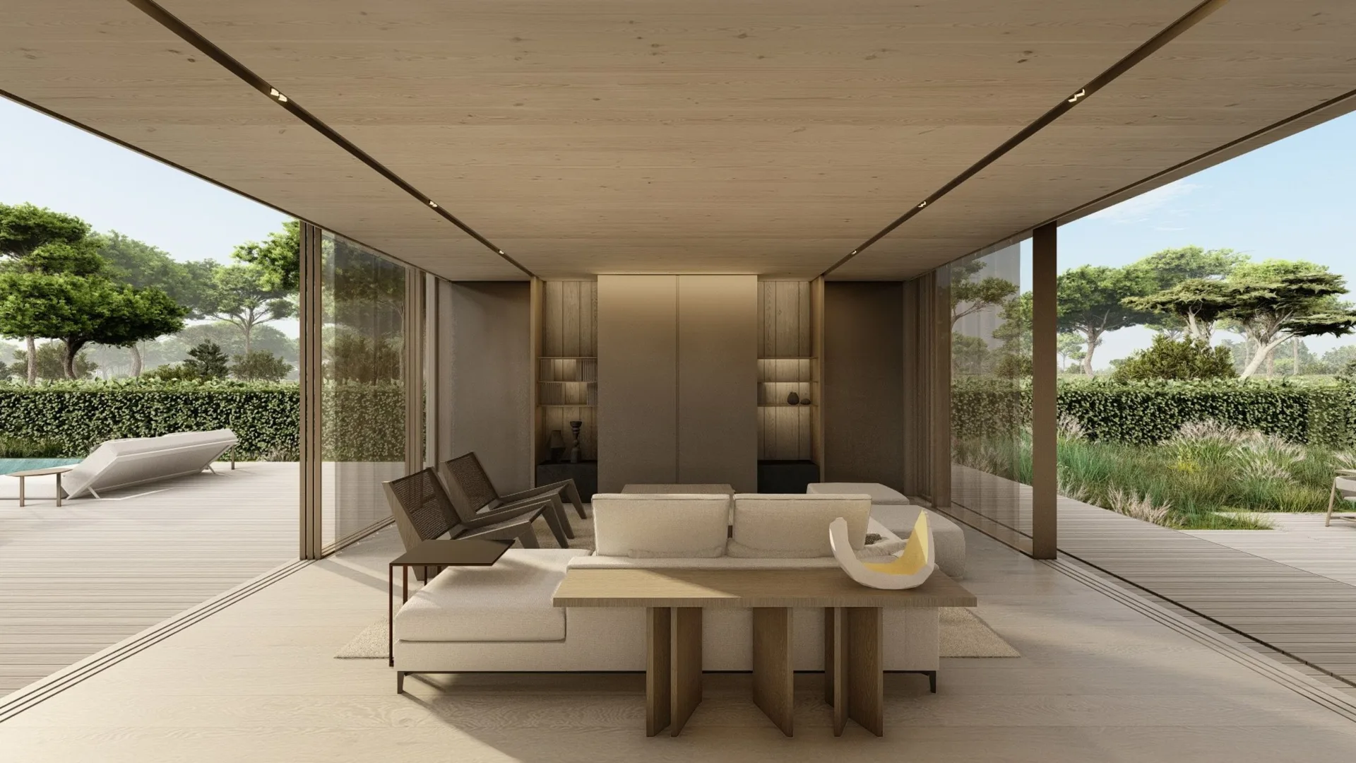 Elegant open-plan lounge with glass walls overlooking a pool terrace